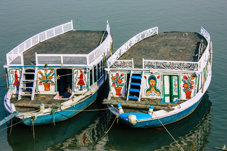 Varanasi India November 8, 2018 View of Indian boats parked at the Ganga river in Varanasi in the afternoonのeditorial素材