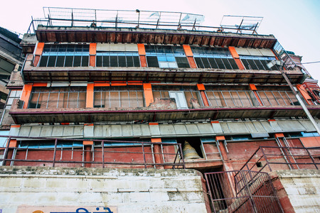 Varanasi India November 8,2018 View of the facade of the building located at Varanasi ghats front the Ganga river in the afternoonのeditorial素材