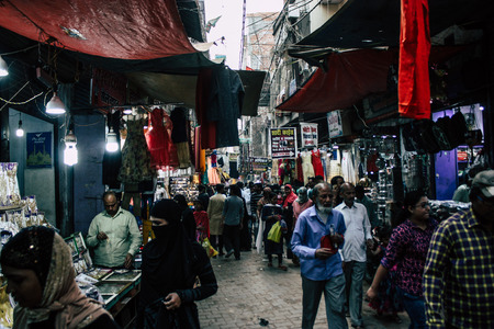 Varanasi India November 10, 2018 View of unknowns people walking in the bazaar at the Arabian district of the old city of Varanasi in the afternoonのeditorial素材