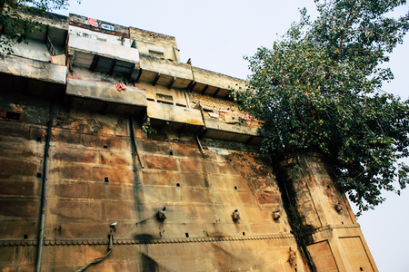Varanasi India November 10, 2018 View of the building located at the ghats of Varanasi front the Ganges river in the afternoonのeditorial素材
