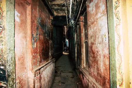 Varanasi India November 10, 2018 View of the traditional narrow street in the old city of Varanasi in the afternoonのeditorial素材