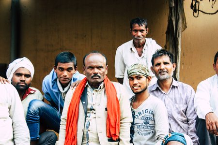 Varanasi India November 10, 2018 View of the wood sellers for the ceremony of the cremation at Manikarnika Ghat front the Ganges river in Varanasi in the afternoonのeditorial素材