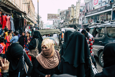 Varanasi India November 10, 2018 View of unknowns people walking in the bazaar at the Arabian district of the old city of Varanasi in the afternoonのeditorial素材