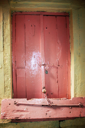Varanasi India November 10, 2018 Closeup of traditional door in the narrow street in the old city of Varanasi in the afternoonのeditorial素材
