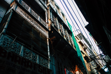 Varanasi India November 10, 2018 View of the traditional narrow street in the old city of Varanasi in the afternoonのeditorial素材