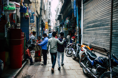 Varanasi India November 10, 2018 View of the traditional narrow street in the old city of Varanasi in the afternoonのeditorial素材