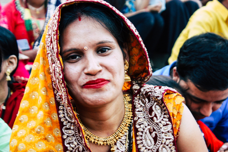 Varanasi India November 11, 2018 View of unknowns Indians people attenting and celebrating Dev Deepavali on the banks of the Ganges river in the afternoonのeditorial素材