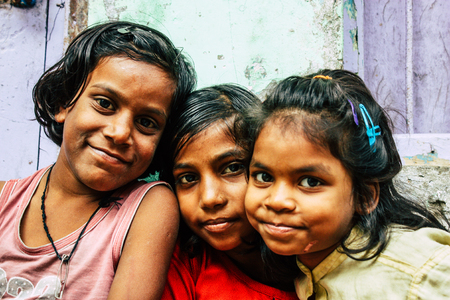 Varanasi India November 11, 2018 Portrait of a young Indian girl having fun in the streets of Varanasi in the afternoonのeditorial素材