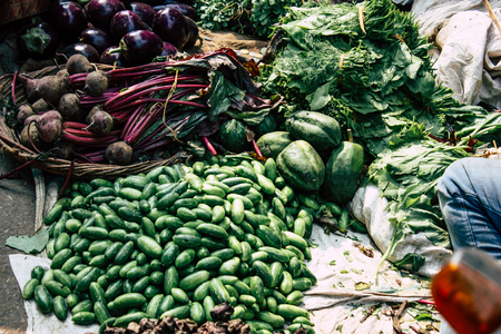 Varanasi India November 11, 2018 View of unknown Indian seller at the vegetables market located in the street front the entry of the Dashashwamedh ghat in the morningのeditorial素材