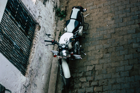 Varanasi India November 12, 2018 Closeup of a classic Royal Enfield motorcycle parked in the streets of Varanasi in the morningのeditorial素材