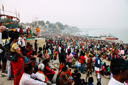 Varanasi India November 11, 2018 View of unknowns Indians people attenting and celebrating Dev Deepavali on the banks of the Ganges river in the afternoonのeditorial素材
