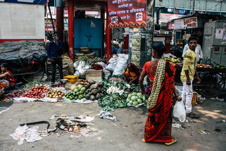 Varanasi India November 11, 2018 View of unknown Indian seller at the vegetables market located in the street front the entry of the Dashashwamedh ghat in the morningのeditorial素材
