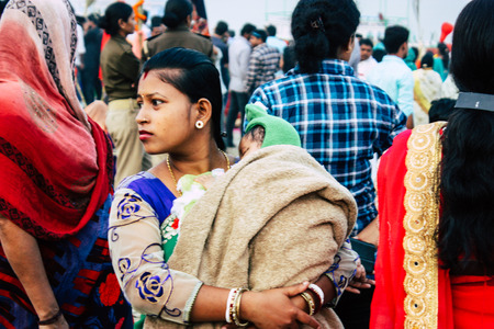 Varanasi India November 11, 2018 View of unknowns Indians people attenting and celebrating Dev Deepavali on the banks of the Ganges river in the afternoonのeditorial素材