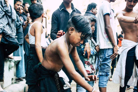 Varanasi India November 17, 2018 View of unknowns Shiite  Muslims use chains and blades during ritual self flagellation as part of the Imam Husain celebration, Ashura commemorations in the Arabian district of Varanasi in the morningのeditorial素材