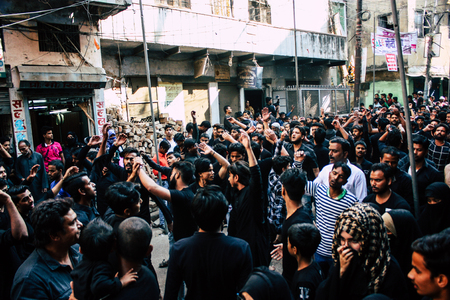 Varanasi India November 17, 2018 View of unknowns Shiite Muslims take part in a procession as part of the Ashura commemorations in the Arabian district of Varanasi  in the morningのeditorial素材