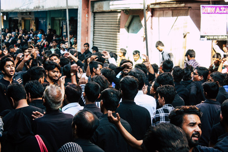 Varanasi India November 17, 2018 View of unknowns Shiite Muslims take part in a procession as part of the Ashura commemorations in the Arabian district of Varanasi  in the morningのeditorial素材