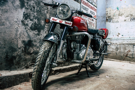 Varanasi India November 19, 2018 Closeup of a classic Royal Enfield motorcycle parked in the streets of Varanasi in the morningのeditorial素材