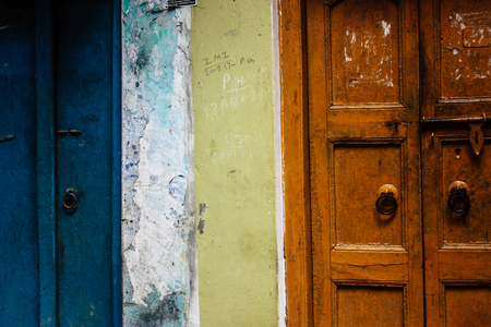 Varanasi India November 19, 2018 Closeup of traditional door in the narrow street in the old district of Varanasi in the afternoonのeditorial素材