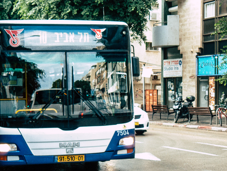 Tel Aviv Israel November 23, 2018 View of a classic Israeli city bus in the traffic circulation in the streets of Tel Aviv in the afternoonのeditorial素材