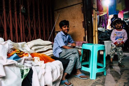 Varanasi India November 18, 2018 View of unknowns Indian people  shopping clothes in the streets of Varanasi in the eveningのeditorial素材