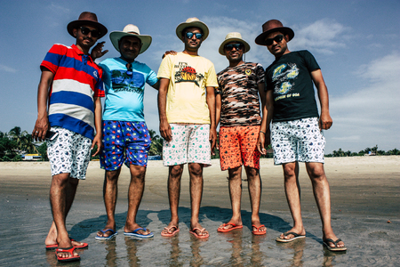 Arambol Goa India November 24, 2018 Portrait of unknown Indian tourist visiting Goa and having fun on the beach of Arambol in the afternoonのeditorial素材