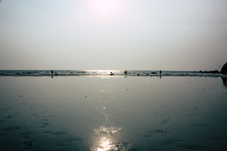 Arambol Goa India November 24, 2018 View of unknowns tourists visiting Goa and walking on the beach of Arambol in the afternoonのeditorial素材