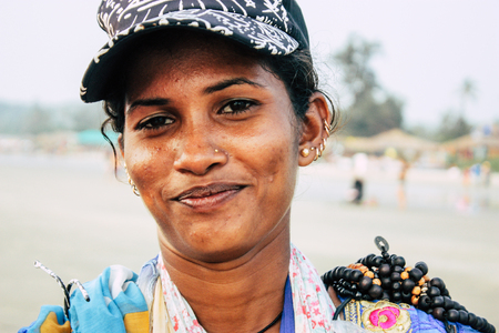 Arambol Goa India November 24, 2018 Portrait of a traditional seller working on the beach of Arambol in the afternoonのeditorial素材