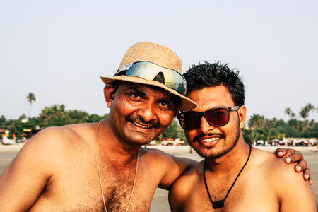 Arambol Goa India November 24, 2018 Portrait of unknown Indian tourist visiting Goa and having fun on the beach of Arambol in the afternoonのeditorial素材