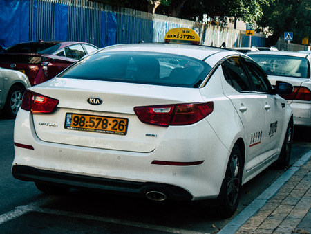 Tel Aviv Israel November 25, 2018  View of a traditional Israeli taxi rolling in the streets of Tel Aviv in the afternoonのeditorial素材