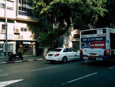 Tel Aviv Israel November 25, 2018  View of a traditional Israeli taxi rolling in the streets of Tel Aviv in the afternoonのeditorial素材
