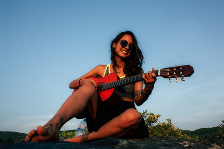 OM beach Gokarna Karnataka India November 30, 2018 Portrait of Reachel Singh, Dutch professional singer performing her latest album on the beach during the sunsetのeditorial素材