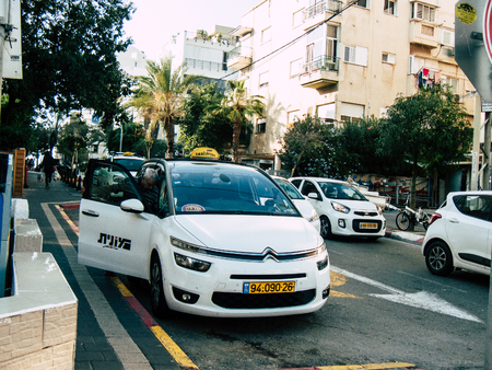 Tel Aviv Israel December 03, 2018 View of a traditional Israeli taxi rolling in the streets of Tel Aviv in the afternoonのeditorial素材