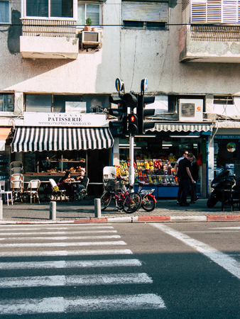 Tel Aviv Israel December 06, 2018 View of unknown Israeli people walking in David BEN GURION road in Tel Aviv in the afternoonのeditorial素材