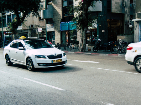 Tel Aviv Israel December 03, 2018 View of a traditional Israeli taxi rolling in the streets of Tel Aviv in the afternoonのeditorial素材