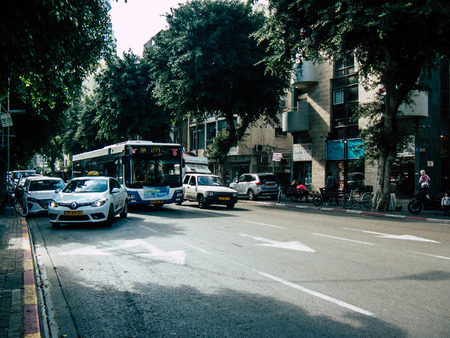 Tel Aviv Israel December 03, 2018 View of a classic Israeli city bus in the traffic circulation in the streets of Tel Aviv in the afternoonのeditorial素材