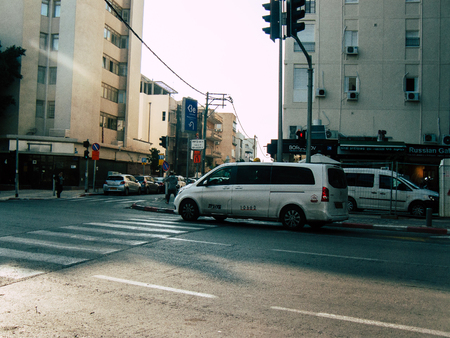 Tel Aviv Israel December 03, 2018 View of a traditional Israeli taxi rolling in the streets of Tel Aviv in the afternoonのeditorial素材