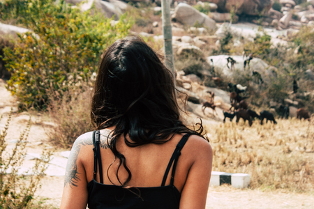 Hampi Karnataka India December 16, 2018 Portrait of Reachel Singh, Dutch professional singer taking inspiration and working on her latest album in Hampi countryside afternoonのeditorial素材