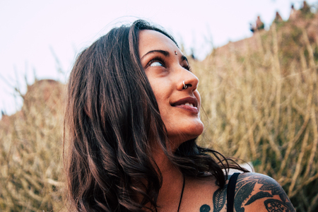 Hampi Karnataka India December 16, 2018 Portrait of Reachel Singh, Dutch professional singer taking inspiration and working on her latest album in Hampi countryside afternoonのeditorial素材