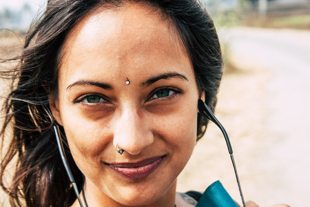 Hampi Karnataka India December 16, 2018 Portrait of Reachel Singh, Dutch professional singer taking inspiration and working on her latest album in Hampi countryside afternoonのeditorial素材