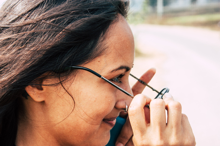 Hampi Karnataka India December 16, 2018 Portrait of Reachel Singh, Dutch professional singer taking inspiration and working on her latest album in Hampi countryside afternoonのeditorial素材