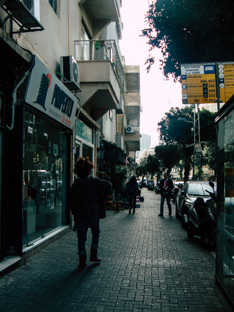 Tel Aviv Israel December 21, 2018 View of unknown Israeli people walking in the streets of Tel Aviv in the afternoonのeditorial素材