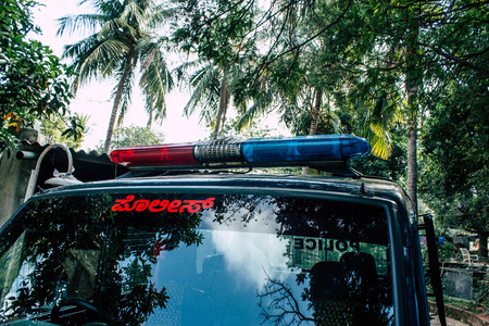 Hampi Karnataka India December 22, 2018 View of a traditional Indian blue police car parked in the streets of Hampi in the morningのeditorial素材