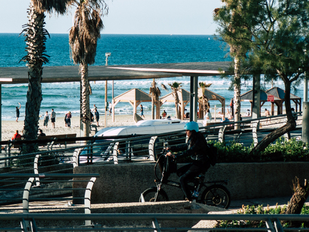 Tel Aviv Israel January 17, 2019 View of an unknown Israeli person on electric bicycle in the center...