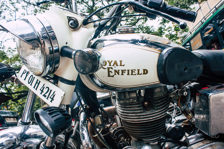 Pondicherry Tamil Nadu India January 21, 2019 View of a Royal Enfield motorcycle parked in the streets of White Town district in the french colonial city of Pondicherry in the morningのeditorial素材