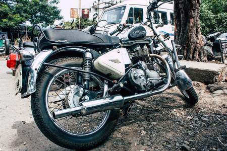 Pondicherry Tamil Nadu India January 21, 2019 View of a Royal Enfield motorcycle parked in the streets of White Town district in the french colonial city of Pondicherry in the morningのeditorial素材