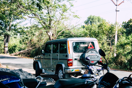 Auroville Tamil Nadu January 24, 2019 View of Indian police officers controling cars at the road to Auroville in southern India in the afternoonのeditorial素材