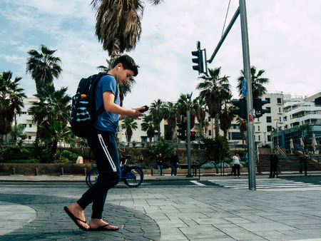 Tel Aviv Israel December 12, 2018 View of unknowns Israeli people walking in the streets of Tel Aviv in the afternoonのeditorial素材