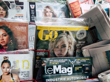 Tel Aviv Israel December 12, 2018 View of Israeli newspapers and magazines sold in the streets of Tel Aviv in the afternoonのeditorial素材