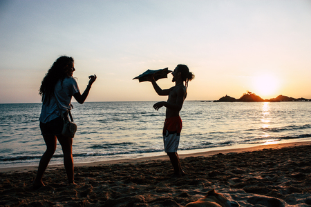 Gokarna Karnataka India January 27, 2019 View of young Israeli people who finished the army and have fun in OM beach in southern Indiaのeditorial素材