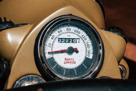 Gokarna Karnataka India February 13, 2019 Closeup of a Royal Enfield motorcycle parked in main road...